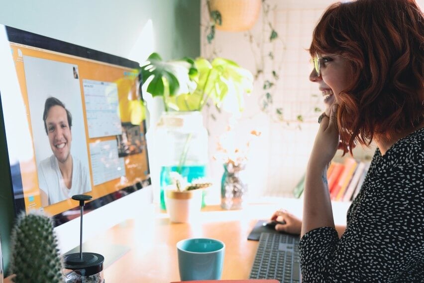 accountant working from home on video call looking at computer screen