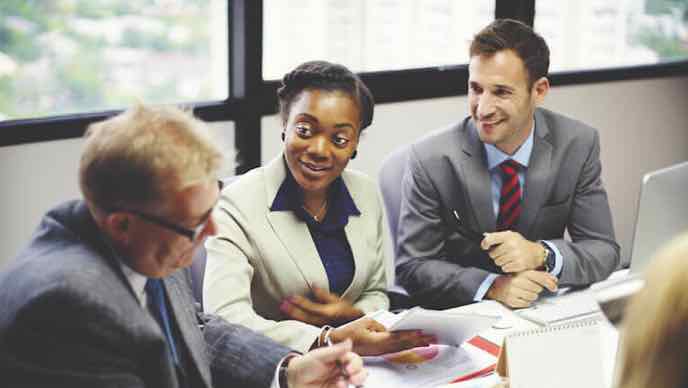 a business meeting with three consultants 